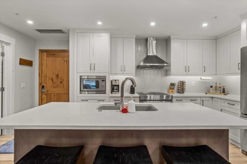 112A-1012 Spring Creek Drive, Canmore, AB - Indoor Photo Showing Kitchen With Upgraded Kitchen