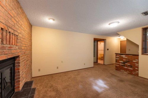 548 Mountain Street, Hinton, AB - Indoor With Fireplace