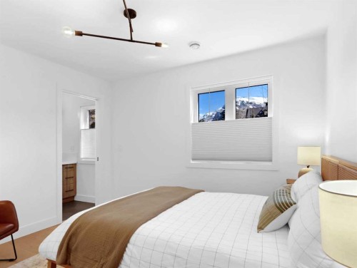 512 8Th Avenue, Canmore, AB - Indoor Photo Showing Bedroom