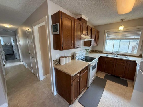 458 Collinge Road, Hinton, AB - Indoor Photo Showing Kitchen With Double Sink