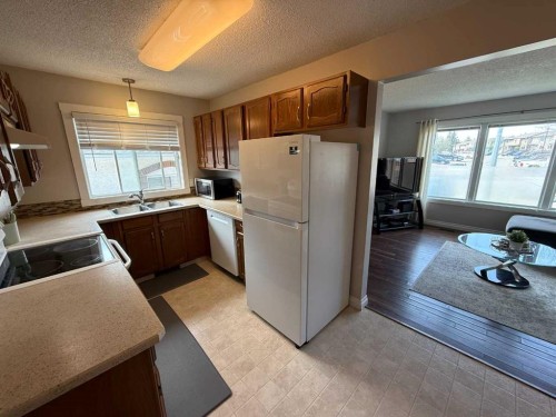458 Collinge Road, Hinton, AB - Indoor Photo Showing Kitchen With Double Sink