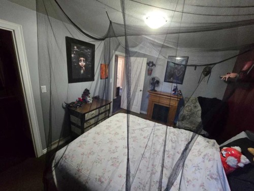 1207 61 Street, Edson, AB - Indoor Photo Showing Bedroom