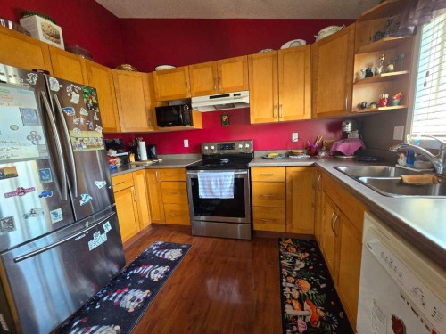 1207 61 Street, Edson, AB - Indoor Photo Showing Kitchen With Double Sink