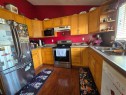 1207 61 Street, Edson, AB  - Indoor Photo Showing Kitchen With Double Sink 