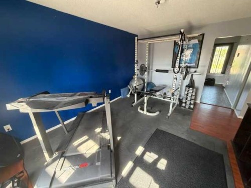 1206 50 Street, Edson, AB - Indoor Photo Showing Gym Room