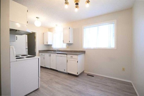4618 54 Street, Athabasca, AB - Indoor Photo Showing Kitchen With Double Sink