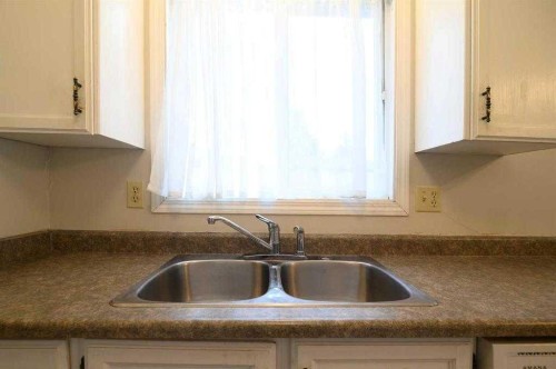4618 54 Street, Athabasca, AB - Indoor Photo Showing Kitchen With Double Sink