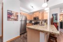 328-101 Montane Road, Canmore, AB  - Indoor Photo Showing Kitchen With Double Sink 