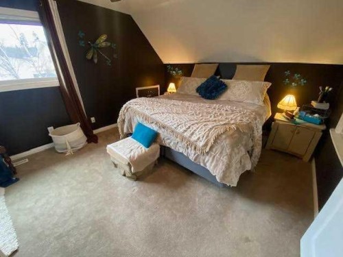 201 Hansen Drive, Hinton, AB - Indoor Photo Showing Bedroom