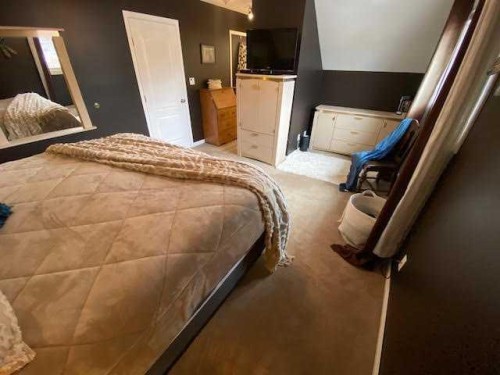 201 Hansen Drive, Hinton, AB - Indoor Photo Showing Bedroom
