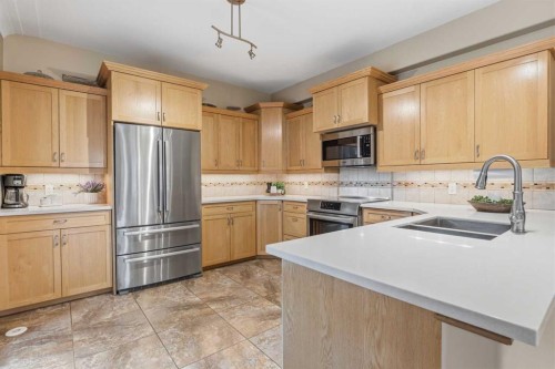 322 4 Street, Rural Woodlands County, AB - Indoor Photo Showing Kitchen With Double Sink