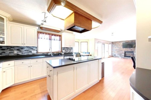23 Springwood Drive Ne, Slave Lake, AB - Indoor Photo Showing Kitchen