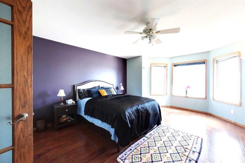 23 Springwood Drive Ne, Slave Lake, AB - Indoor Photo Showing Bedroom