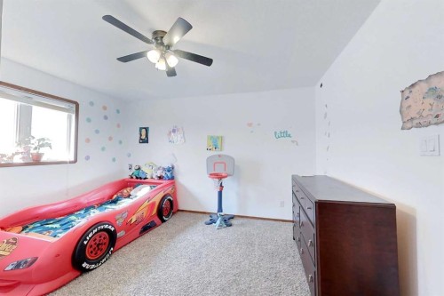 23 Springwood Drive Ne, Slave Lake, AB - Indoor Photo Showing Bedroom