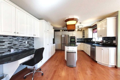 23 Springwood Drive Ne, Slave Lake, AB - Indoor Photo Showing Kitchen