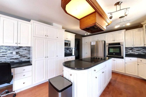 23 Springwood Drive Ne, Slave Lake, AB - Indoor Photo Showing Kitchen