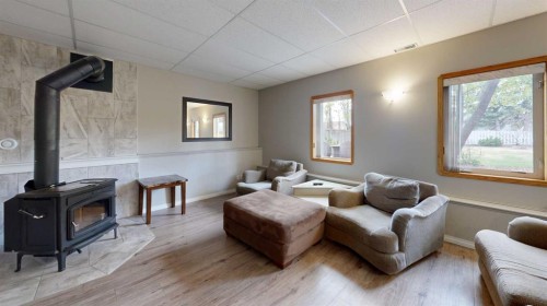 1 Park Close, Whitecourt, AB - Indoor Photo Showing Living Room With Fireplace