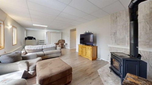 1 Park Close, Whitecourt, AB - Indoor Photo Showing Living Room With Fireplace