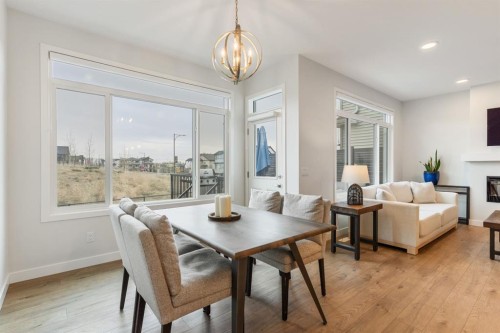 6003 Edmonds Place Nw, Edmonton, AB - Indoor Photo Showing Other Room With Fireplace