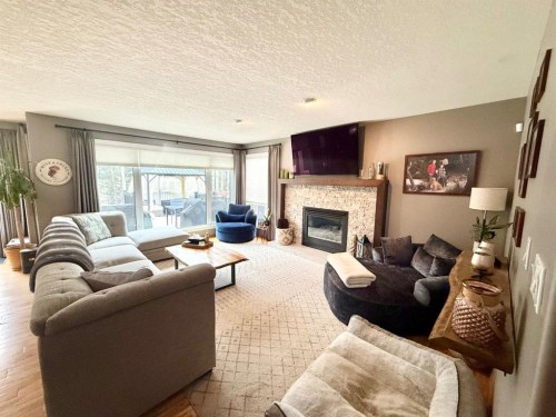 150 Hallam Drive, Hinton, AB - Indoor Photo Showing Living Room With Fireplace
