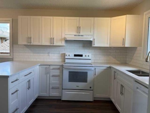 11 Chaisson Crossing, Whitecourt, AB - Indoor Photo Showing Kitchen With Double Sink