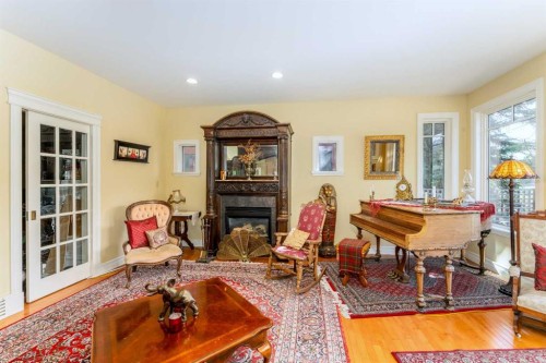533 1St Street, Canmore, AB - Indoor Photo Showing Living Room With Fireplace
