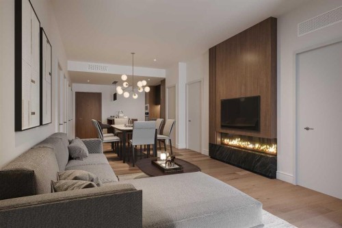 320-1724 Bow Valley Trail, Canmore, AB - Indoor Photo Showing Living Room With Fireplace