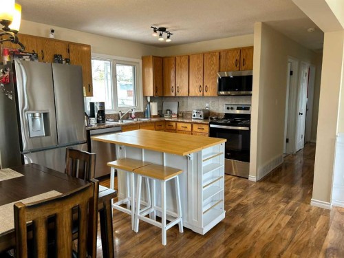 16 Centennial  Crescent, Swan Hills, AB - Indoor Photo Showing Kitchen With Double Sink