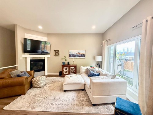 108 Trestle Place, Hinton, AB - Indoor Photo Showing Living Room With Fireplace