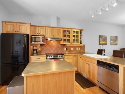 36-300 Eagle Terrace Road, Canmore, AB - Indoor Photo Showing Kitchen With Double Sink