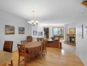 36-300 Eagle Terrace Road, Canmore, AB  - Indoor Photo Showing Dining Room With Fireplace 