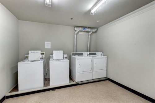 202-186 Kananaskis Way, Canmore, AB - Indoor Photo Showing Laundry Room