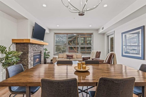 302-1105 Spring Creek Drive, Canmore, AB - Indoor Photo Showing Dining Room