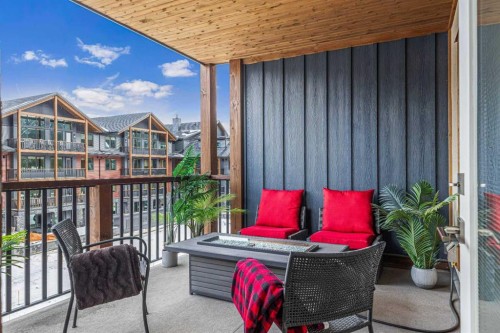 302-1105 Spring Creek Drive, Canmore, AB - Outdoor With Exterior