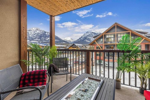 302-1105 Spring Creek Drive, Canmore, AB - Outdoor With Exterior