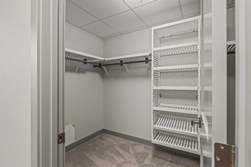 302-1105 Spring Creek Drive, Canmore, AB - Indoor With Storage