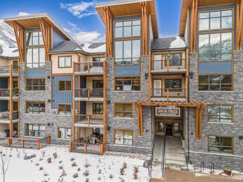 302-1105 Spring Creek Drive, Canmore, AB - Outdoor With Facade
