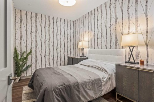 302-1105 Spring Creek Drive, Canmore, AB - Indoor Photo Showing Bedroom