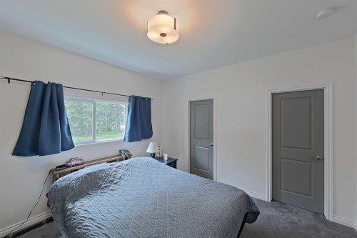 693069 265 Range, Smith, AB - Indoor Photo Showing Bedroom