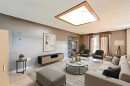 7417 35Th Avenue Nw, Calgary, AB  - Indoor Photo Showing Living Room 