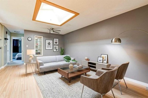 7417 35Th Avenue Nw, Calgary, AB - Indoor Photo Showing Living Room