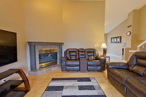 2904 45 Avenue, Athabasca, AB - Indoor Photo Showing Living Room With Fireplace