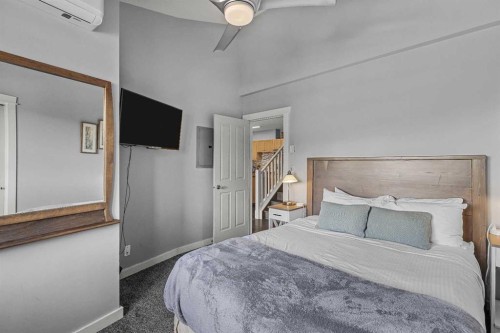 321-107 Montane Road, Canmore, AB - Indoor Photo Showing Bedroom