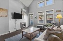 321-107 Montane Road, Canmore, AB  - Indoor Photo Showing Living Room With Fireplace 