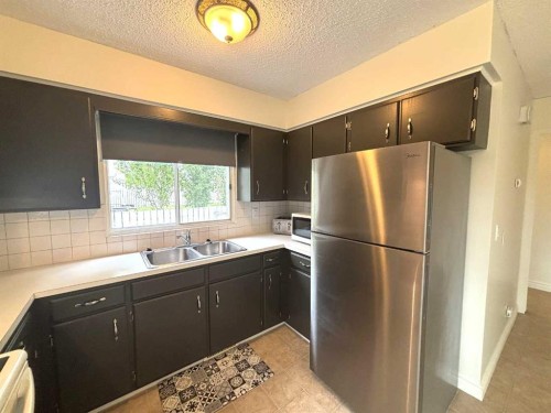 45A Kallbom Crescent, Whitecourt, AB - Indoor Photo Showing Kitchen With Double Sink