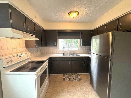 45A Kallbom Crescent, Whitecourt, AB - Indoor Photo Showing Kitchen With Double Sink