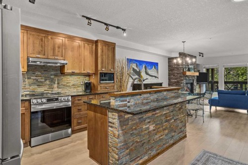 218-106 Stewart Creek Landing, Canmore, AB 