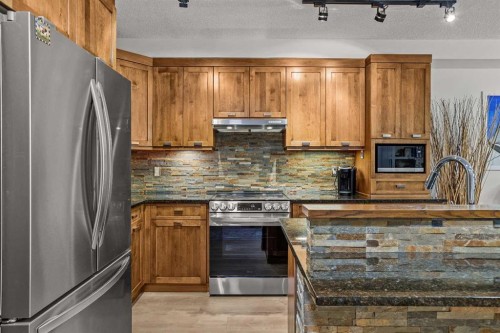 218-106 Stewart Creek Landing, Canmore, AB 
