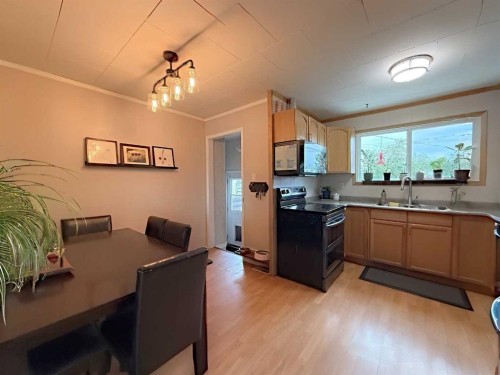 1109 56 Street, Edson, AB - Indoor Photo Showing Kitchen With Double Sink