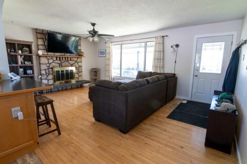 5320 12 Avenue, Edson, AB - Indoor Photo Showing Living Room With Fireplace